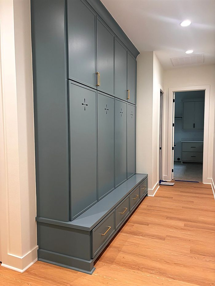 111 Bear Den Court &mdash; Mudroom lockers and bench in deep blue-green