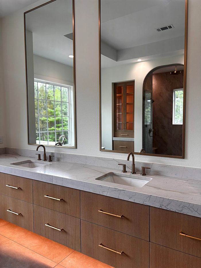 111 Bear Den Court &mdash; Double vanity in rift oak with marble top and brass fittings