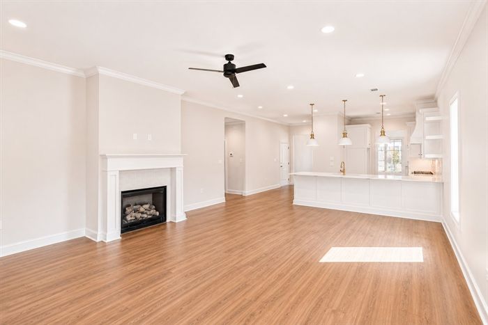 114 Kinley Loop — Great room with fireplace open to the kitchen