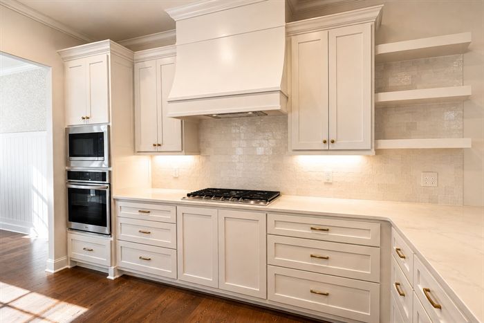 114 Kinley Loop — Range wall with vent hood and double wall ovens