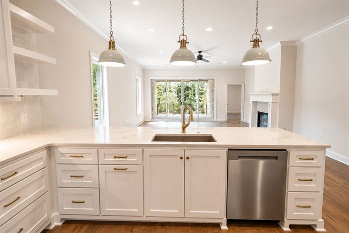 114 Kinley Loop — Kitchen sink and window with wooded view