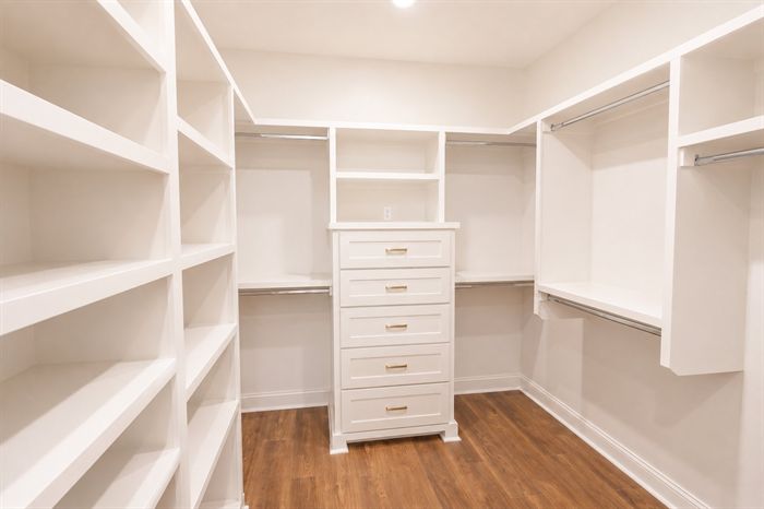 114 Kinley Loop — Walk-in closet with built-in shelving and drawers