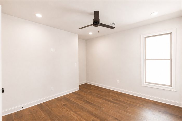 114 Kinley Loop — Bedroom with vaulted ceiling and ceiling fan