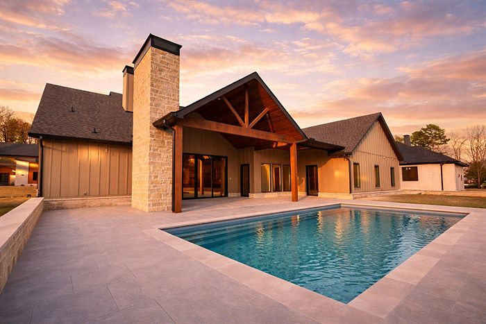 115 Bear Den Court — Pool and covered patio at twilight