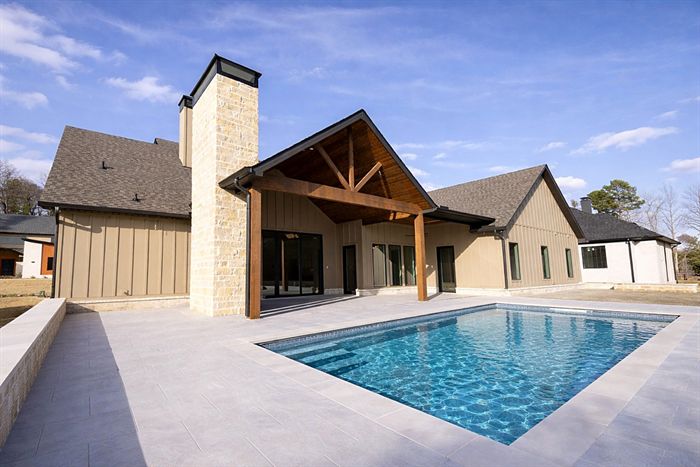115 Bear Den Court &mdash; Pool and outdoor living pavilion by day