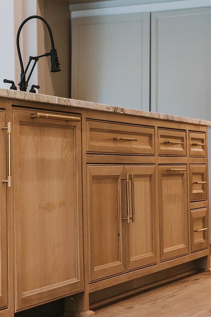 115 Bear Den Court &mdash; White oak cabinetry with brass hardware