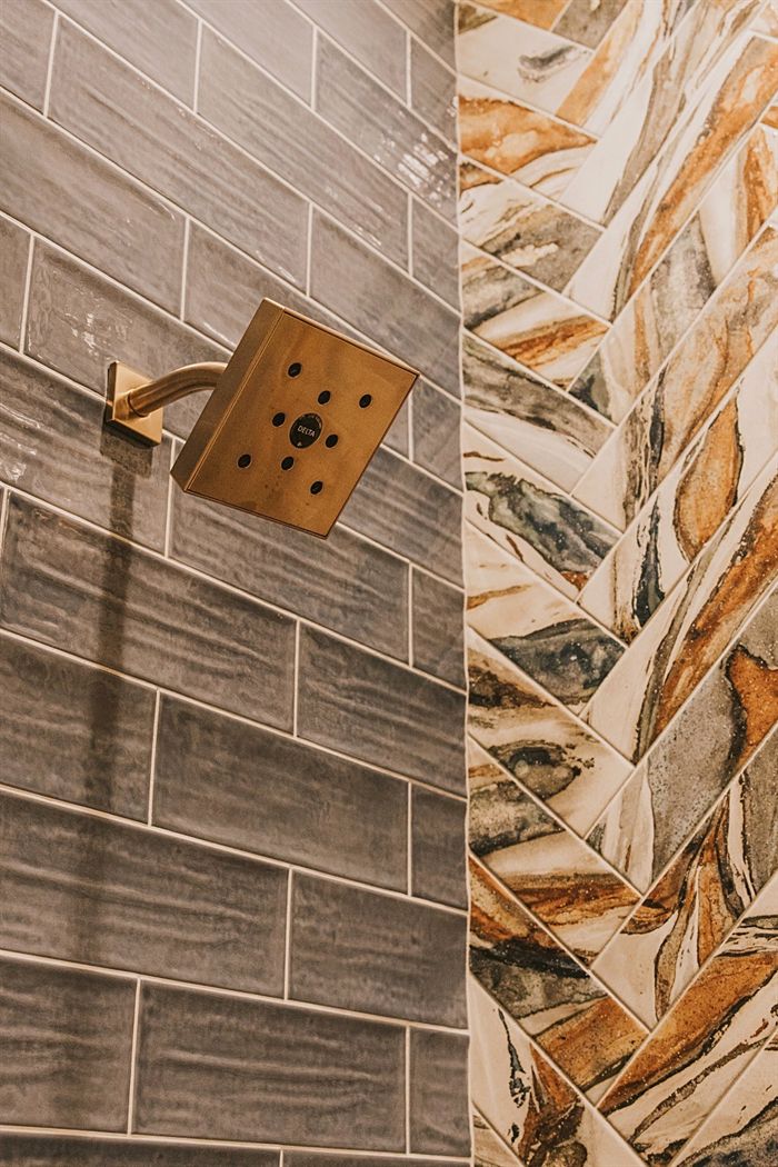 115 Bear Den Court &mdash; Shower fitting against patterned stone tile