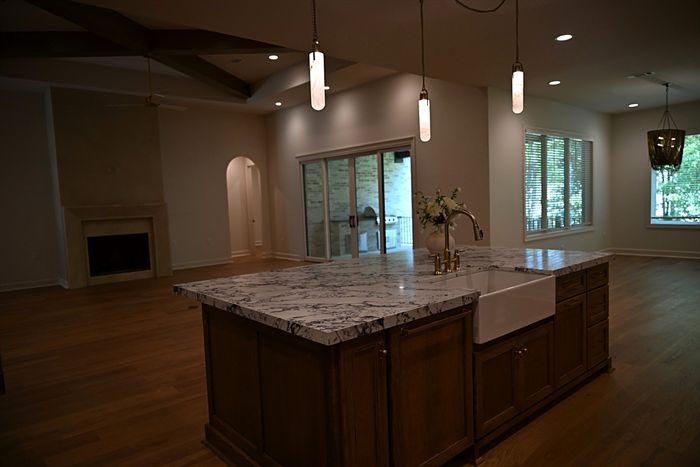 217 Abington Circle &mdash; Kitchen island beneath the beamed ceiling