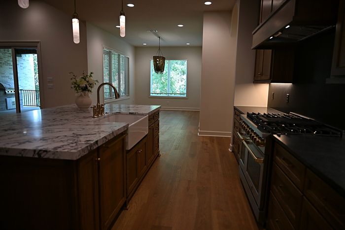 217 Abington Circle &mdash; Kitchen island looking toward the range and hood