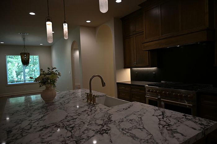 217 Abington Circle &mdash; Marble island detail with alabaster pendants