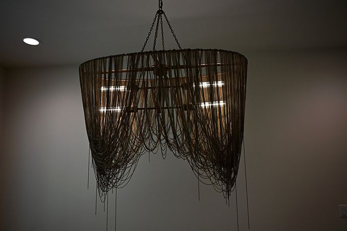 217 Abington Circle &mdash; Woven wire chandelier above the island