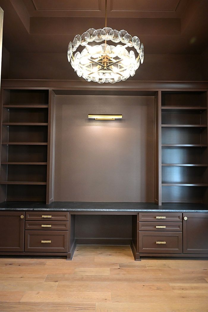 217 Abington Circle &mdash; Study closet in stained walnut with crystal fixture