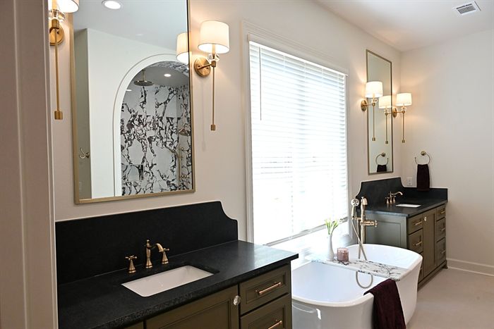 217 Abington Circle &mdash; Primary vanity looking toward the arched marble shower